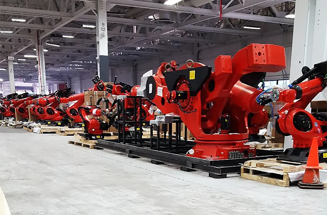 Photos divulguées de Tesla révèlent les « robots aliens » qui assembleront les Model 3.