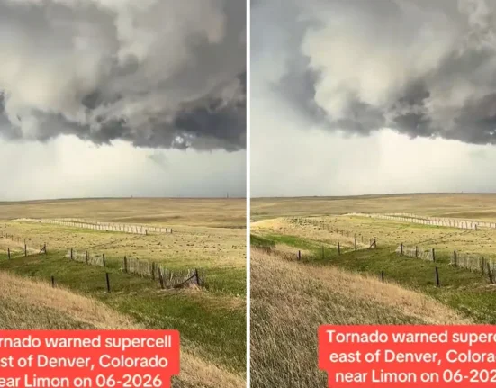 Pourchasseur d'orage : Suivi d'une supercellule menace-tornade avec un nuage mural tournoyant à l'est de Denver.